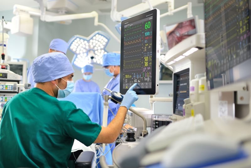 Surgeons looking at an EMR